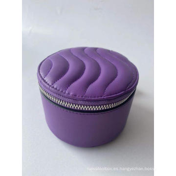 Estuche cosmético morado como Candy Box